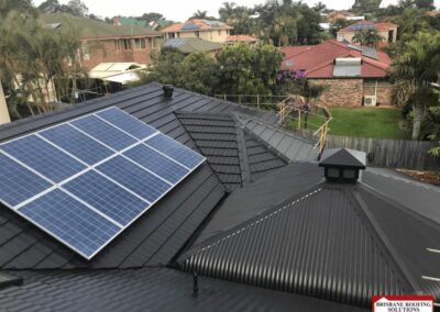 roof restoration with solar panels brisbane